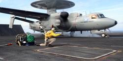 An E-2D Advanced Hawkeye assigned to Air Test and Evaluation Squadron (VX) 20 makes its first carrier takeoff aboard the aircraft carrier USS Harry S. Truman (CVN 75). The 